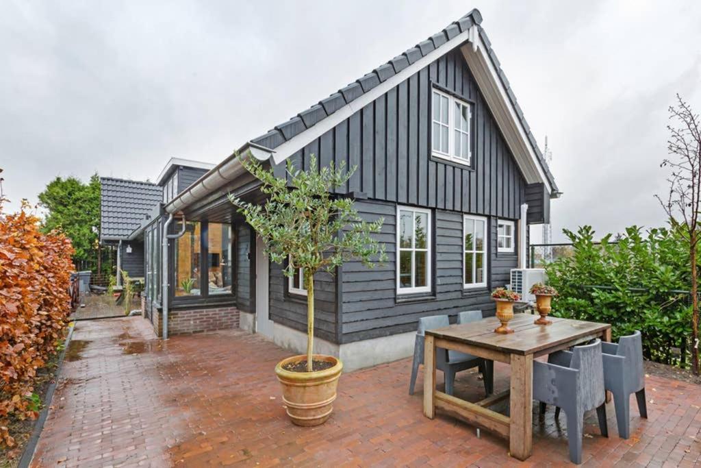 Uniek Houten Huis Nabij Bos En Plassen Hollandsche Rading Kültér fotó
